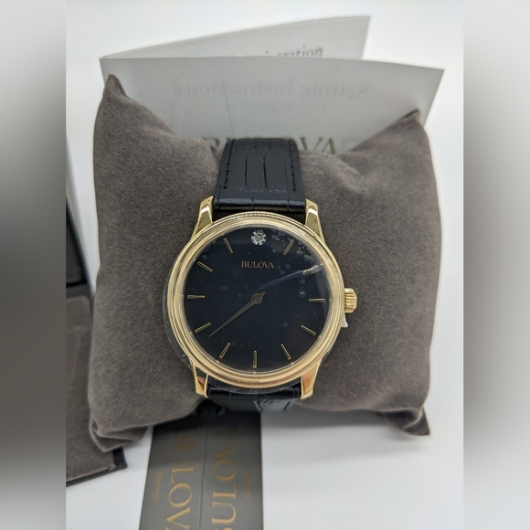 Bulova Other - Sold NIB Bulova 97F55 Wrist Watch for Men Gold/Black w/ Black Leather Strap